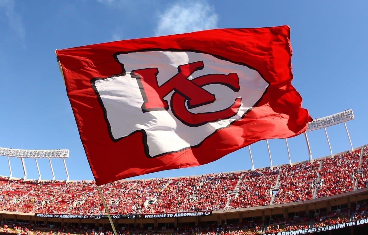 Chiefs flag waves in Arrowhead Stadium.