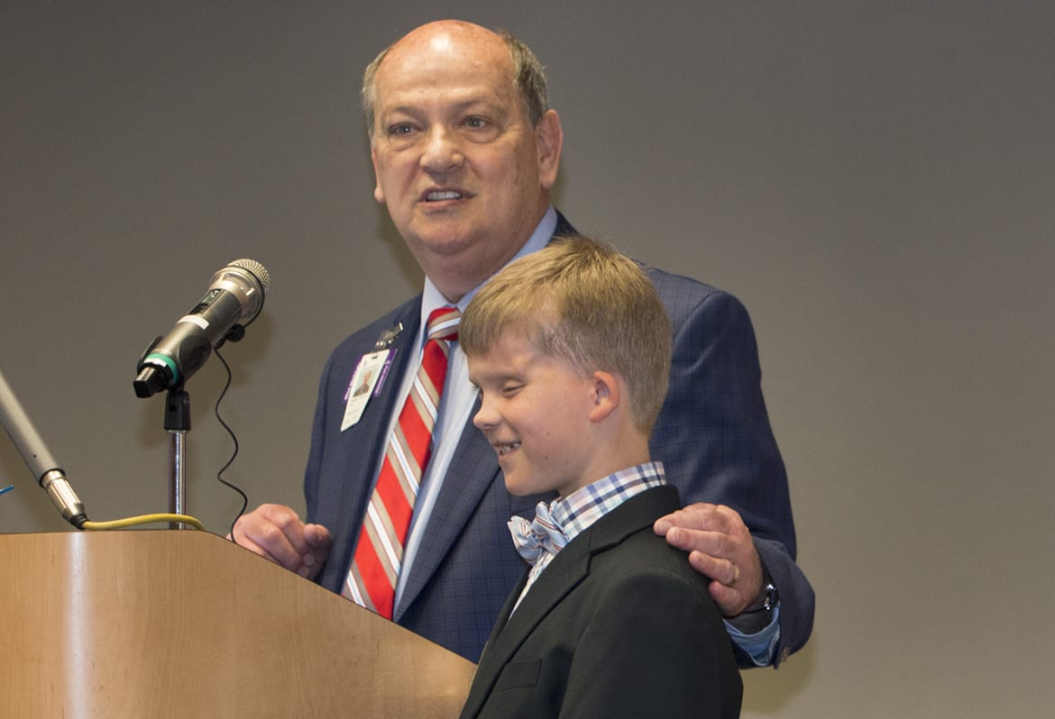 Children's Mercy CEO with former patient Charlie Walsh