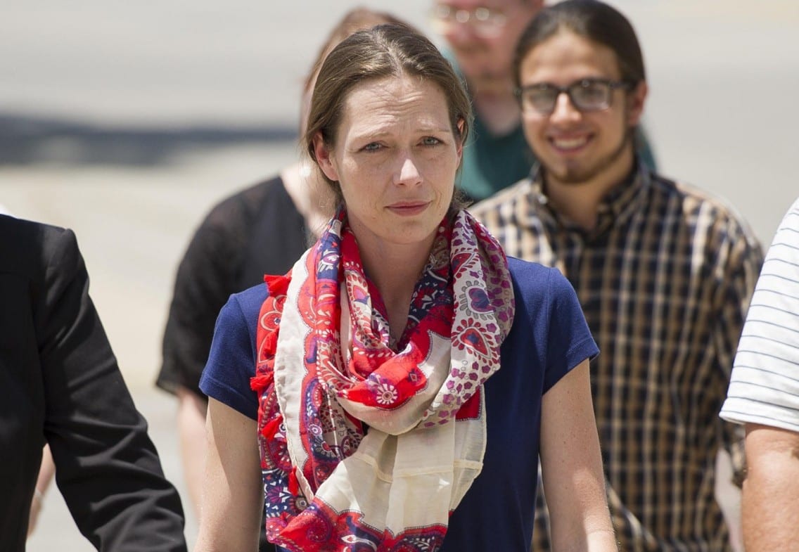 Shona Banda, shown here after she was booked into jail and then released after posting bond in June, is preparing to sue Kansas Gov. Sam Brownback, the Kansas Department for Children and Families and the Garden City Police Department. (Photo: James Dobson | Garden City Telegram)