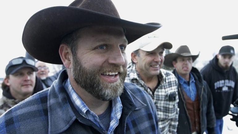 Ammon Bundy, one of the sons of Nevada rancher Cliven Bundy, arrives for a news conference at Malheur National Wildlife Refuge after meeting with Harney County Sheriff David Ward near Burns, Ore. Ward and two other Oregon sheriffs met Thursday with Bundy, the leader of an armed group occupying a federal wildlife refuge and asked them to leave, after residents made it clear they wanted them to go home. (Photo: Rick Bowmer | AP)