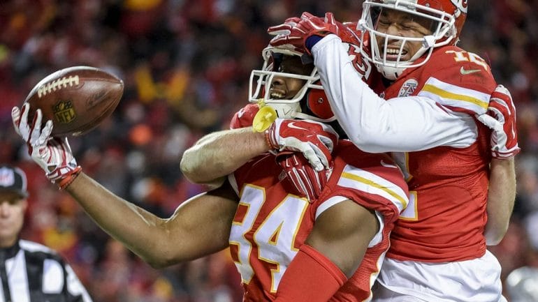 The Kansas City Chiefs had much to celebrate during last weekend's win over the Oakland Raiders. The victory takes us to this weekend's playoff game in Texas. (Photo: Reed Hoffmann | AP)