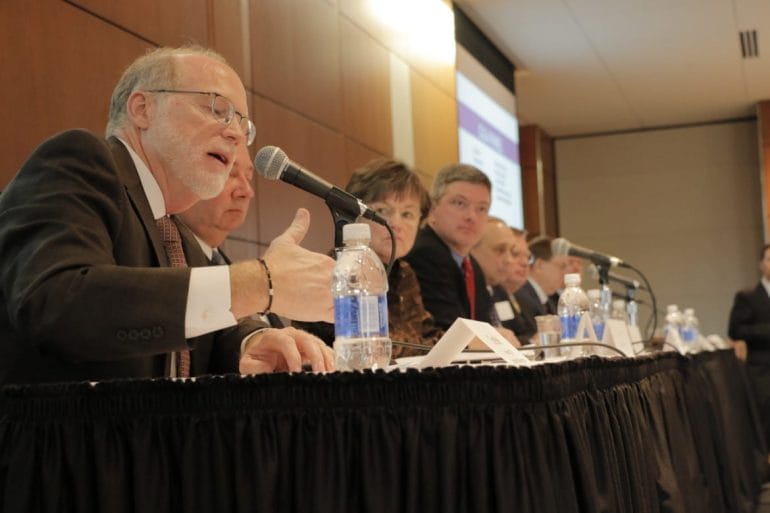 panelist makes a point at the forum