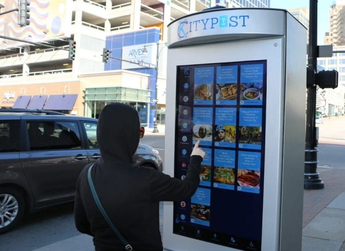 A person using a smart kiosk