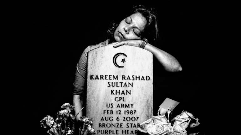 A woman at the grave of her soldier son