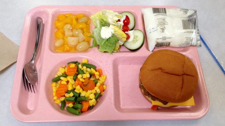 A school lunch tray with food