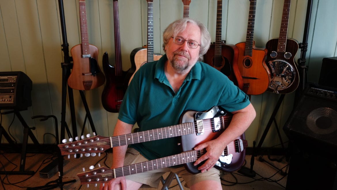 Guitar-maker Dave Wendler with Wendler a custom built electroCoustic double neck 12-string/6-string that is being shipped today to a repeat customer in New York. (Photo: Dan Calderon)