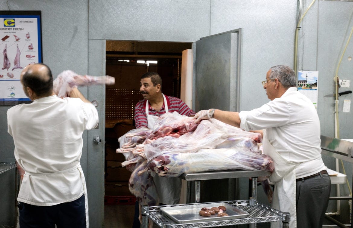 Butchers with meat