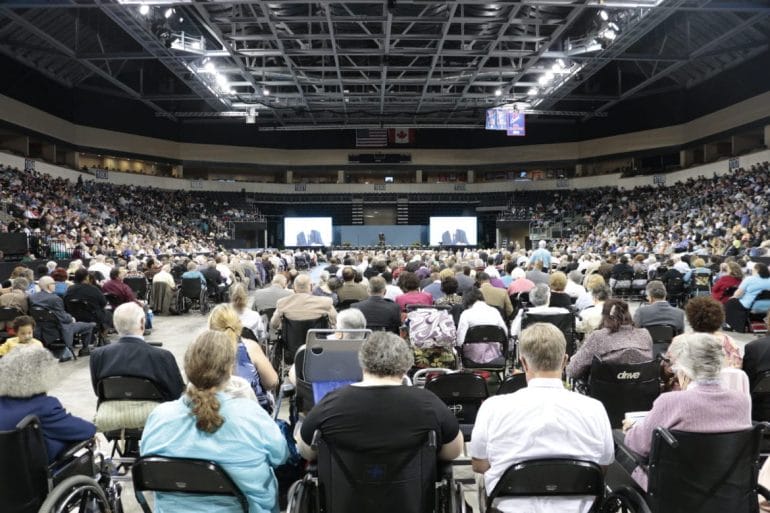 A crowd of people inside an arena