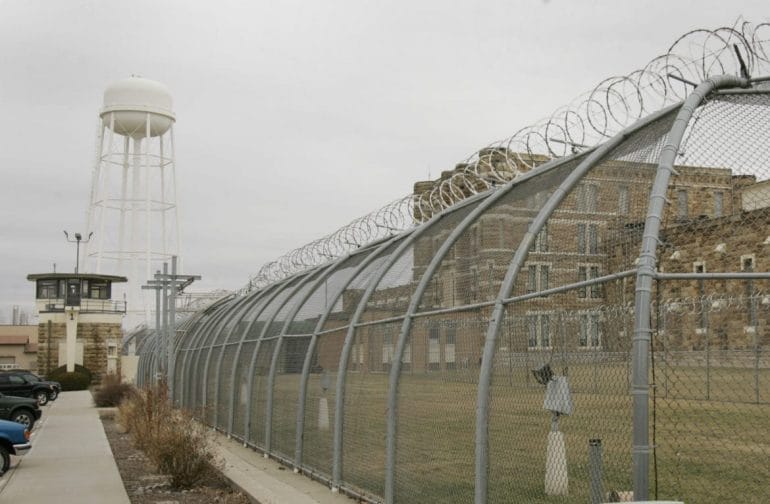 barbed wire around state correctional facility