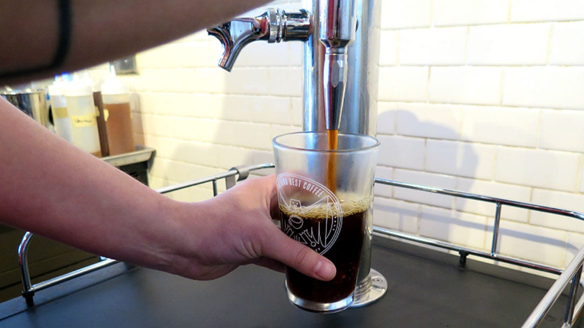 Coffee Being Poured From a Tap