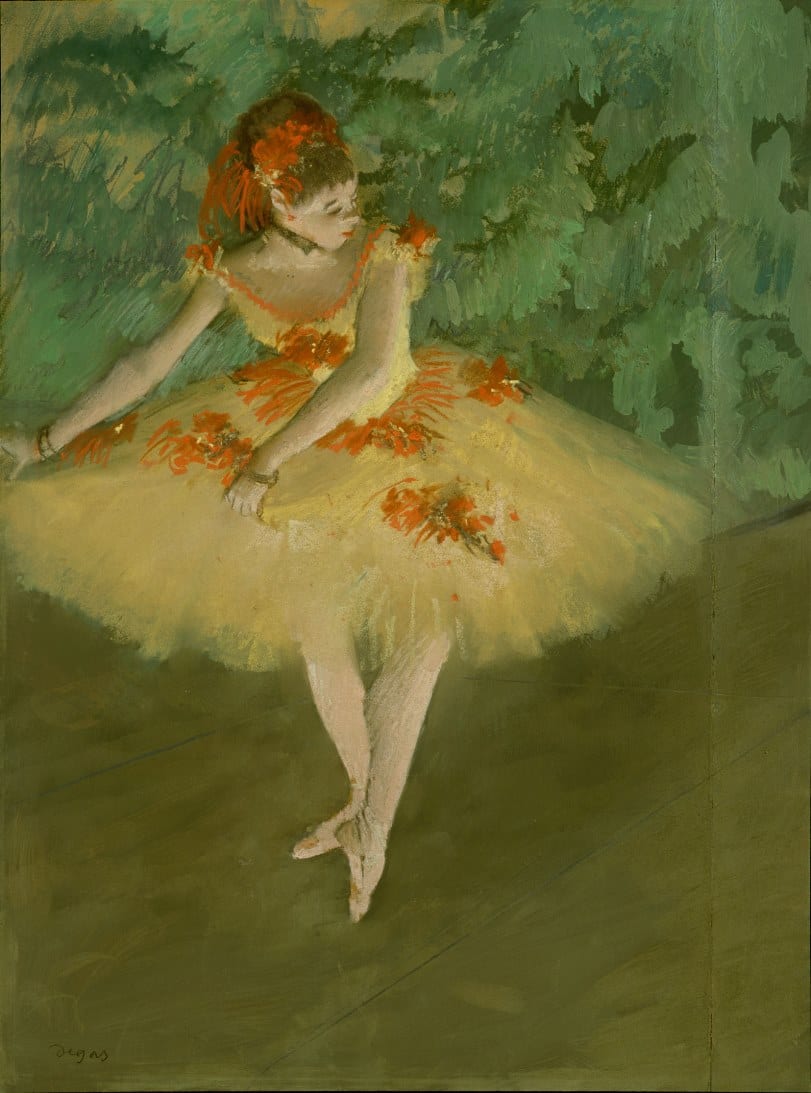 A painting by Degas of a ballerina.