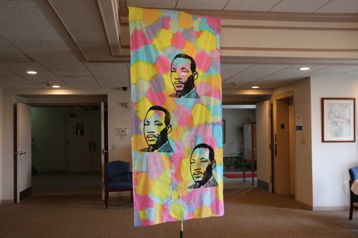 A banner with Martin Luther King Jr.'s face on it.