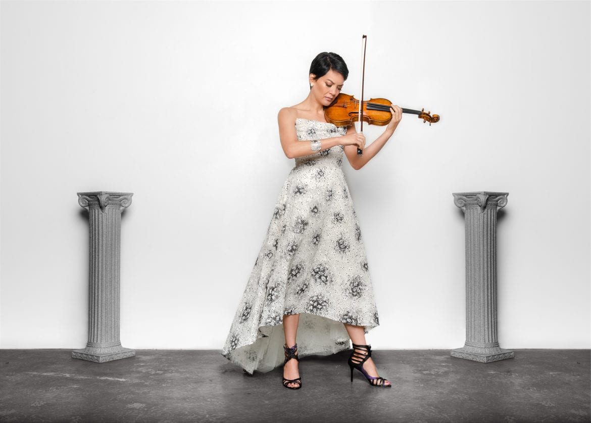 A woman playing the violin.