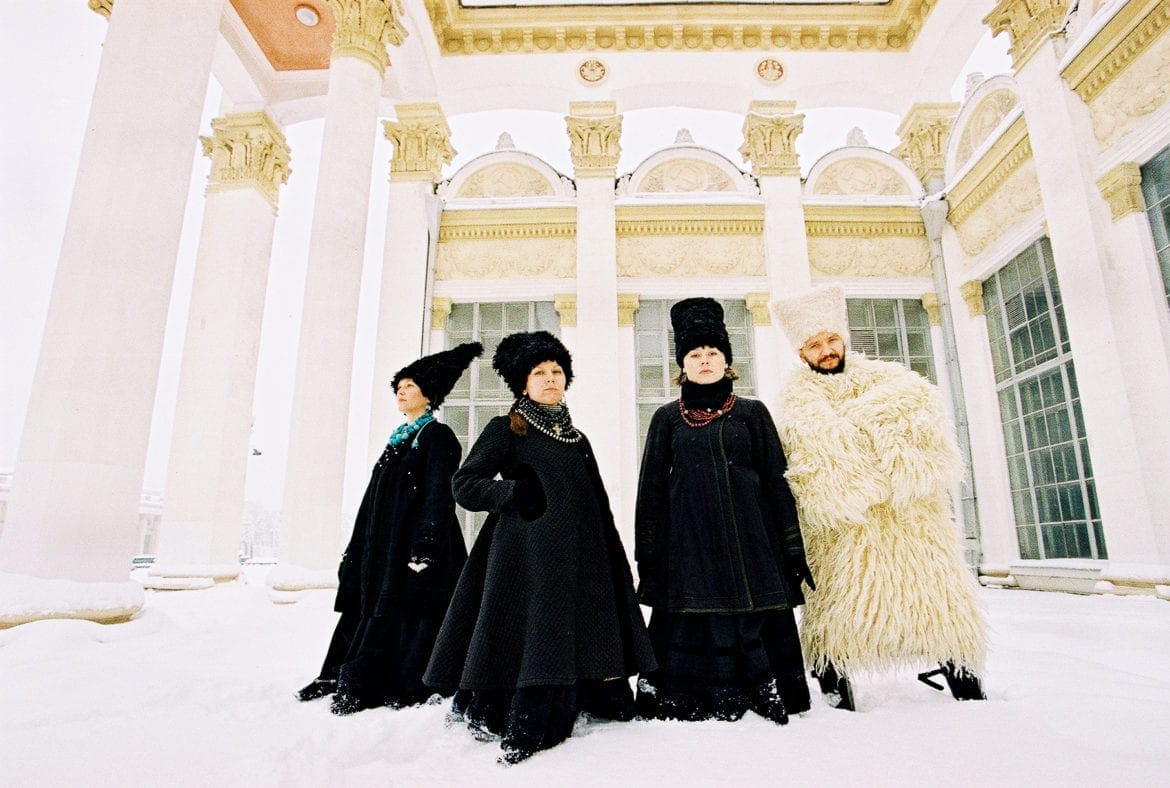Four individuals dressed in traditional Ukrainian wardrobe.