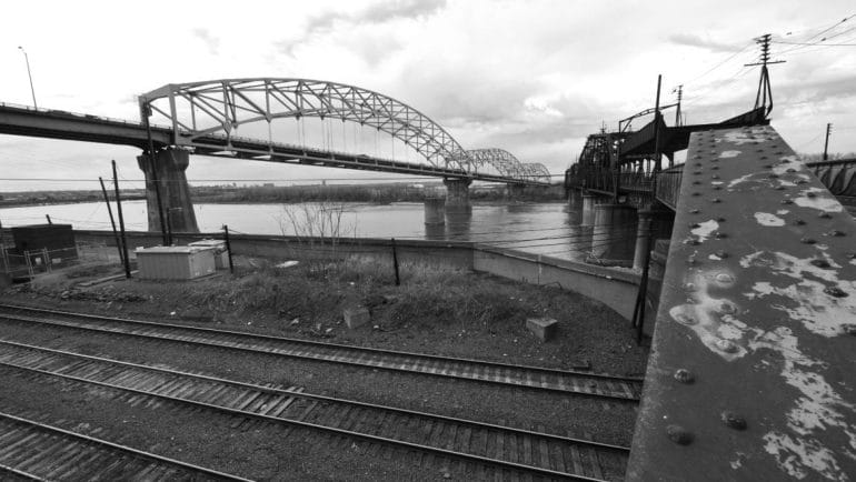 The Buck O'Niel Bridge, left, and Second Hannibal Bridge, right, span the Missouri River.