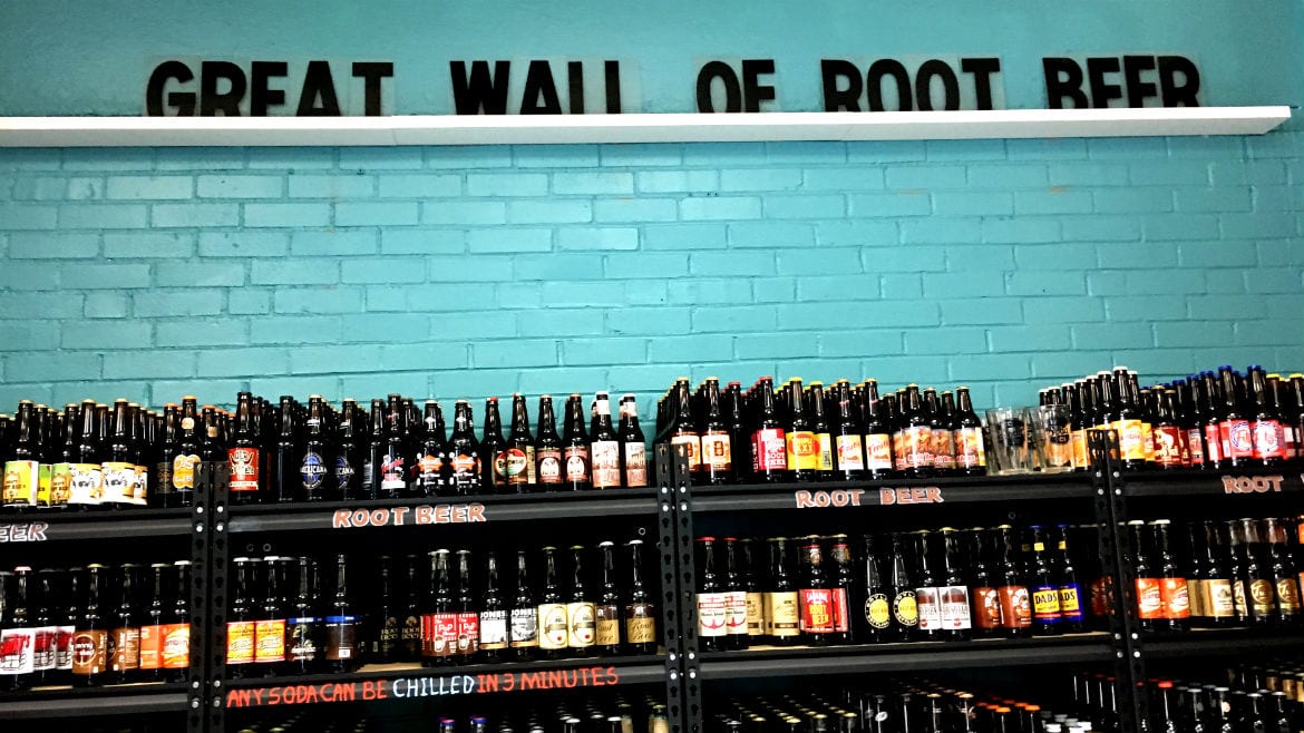 great wall of root beer inside KC Soda Co.