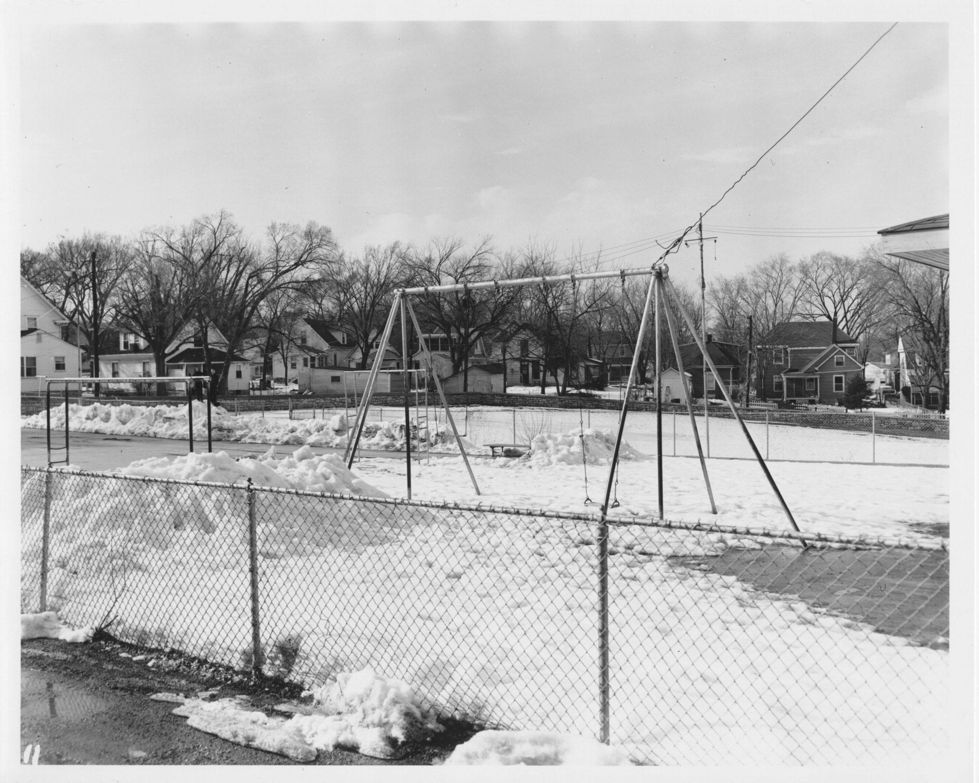 A fence separated the playground outside the Kansas City Orphan Boys’ Home from Westport Road.