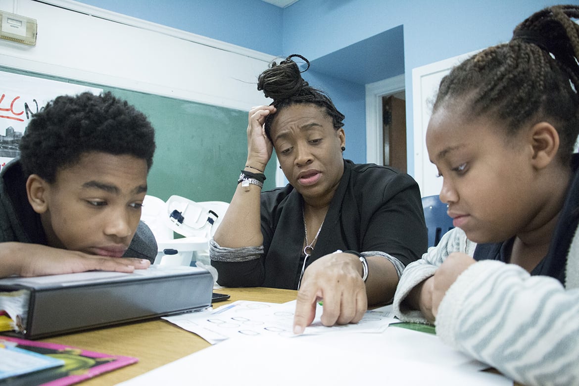 Tameko Davison helping with homework