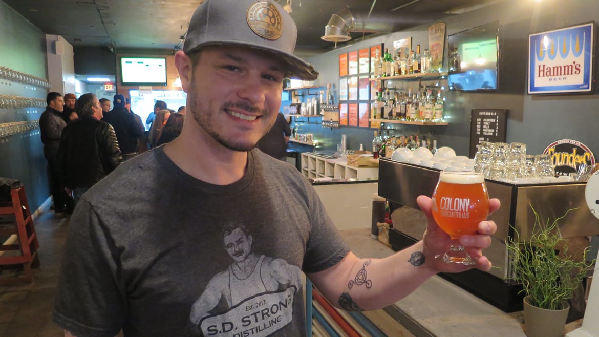 Kansas City brewer Rodney Beagle hefts a glass of Island Pie coconut cream pie ale