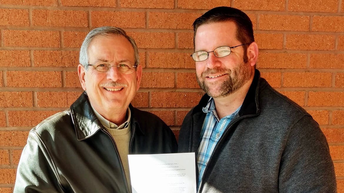 Bob Bacic (left) of Holy Cross Catholic Church and the Rev. Zac Sturm of Atonement Lutheran Church