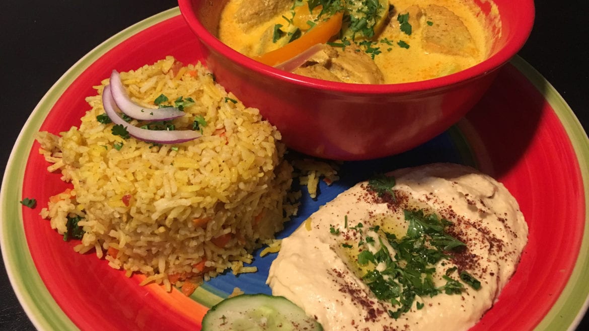 The chicken curry, rice and hummus at Kinzi Mediterranean Restaurant.