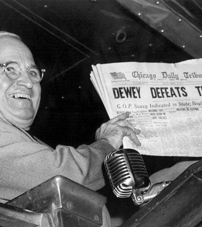 Harry Truman celebrating his upset election victory over Thomas Dewey.
