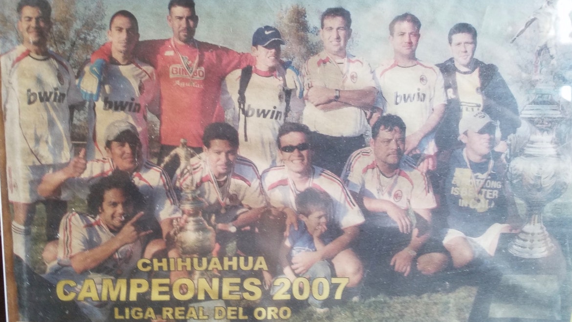 The Santa Fe Wanderers soccer club pose with a trophy