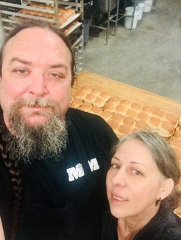 Jim and Andrea Martin stand in their bakery, M&M Bakery, in Lawrence, Kansas