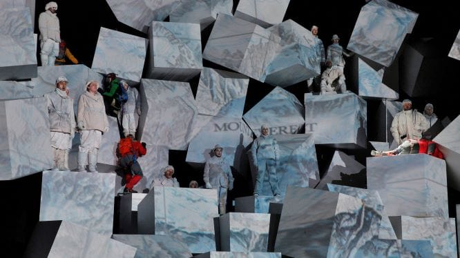 James Symmonds ascends the 35-foot stage set in the Lyric Opera's production of "Everest."