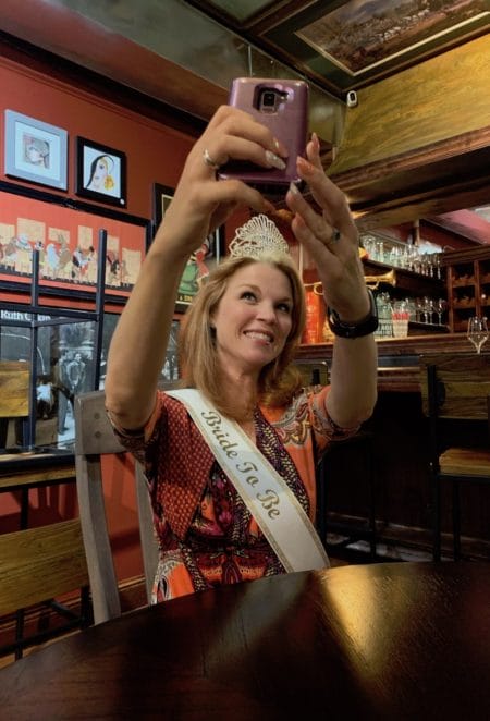 Stacy snaps a selfie in a tiara and 'Bride To Be' sash. 