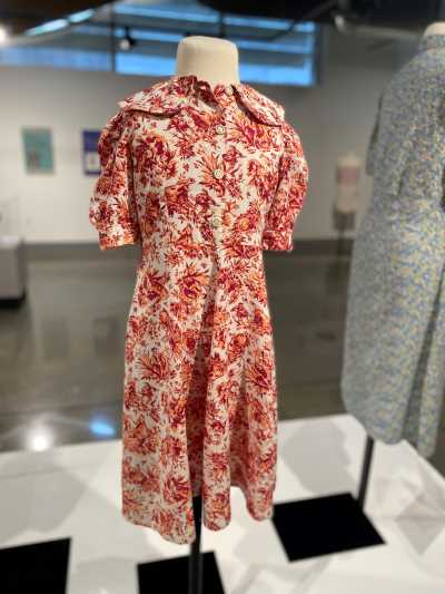 A feed sack dress dating from 1935 now on display as part of the Thrift Style exhibit at the Johnson County Museum.