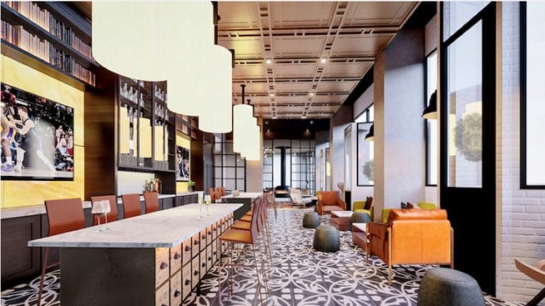 A rendering of the coffee bar and entertainment kitchen at the Midland Lofts.