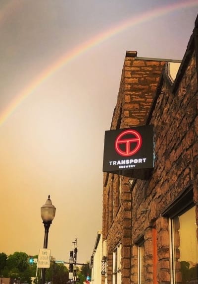 A rainbow over Transport Brewery in Shawnee