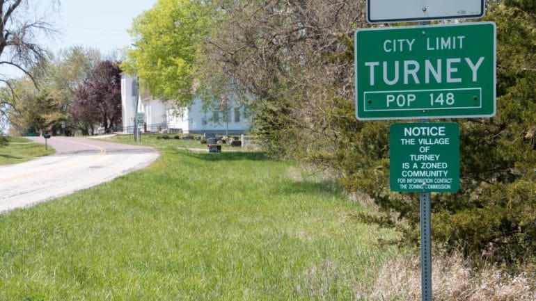 The population sign at the edge of Turney, Missouri. The village will be the focus of a new experiment testing rural broadband expansion technology.