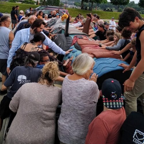 When creators of a totem pole that will be permanently housed in Washington, D.C., made a stop at Liberty Memorial in Kansas City in June, the Kansas City Indian Center helped to sponsor an event attended by several dozen people for the blessing of that artwork.