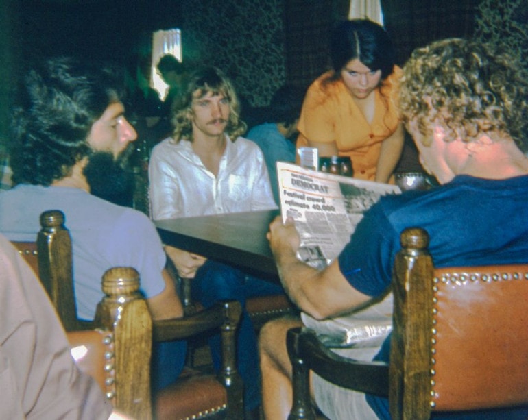 Joe Walsh (second from left) and his band photographed at the Ramada Inn in Sedalia, Missouri.