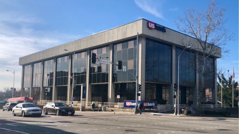 Mac Properties plans to completely renovate the US Bank building at Main Street and Armour Boulevard as part of a much larger streetcar-oriented project.