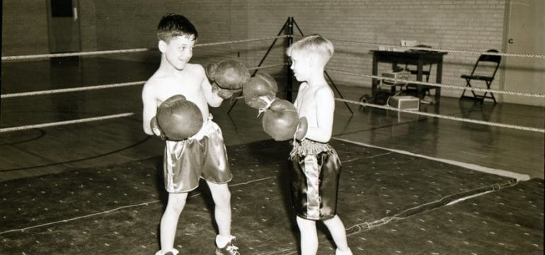 The Jackson County juvenile court officials who established the McCune Home for Boys in 1907 believed boxing to be part of the path to responsible adulthood. This undated photo suggests the program continued for decades and included participants of many age brackets.
