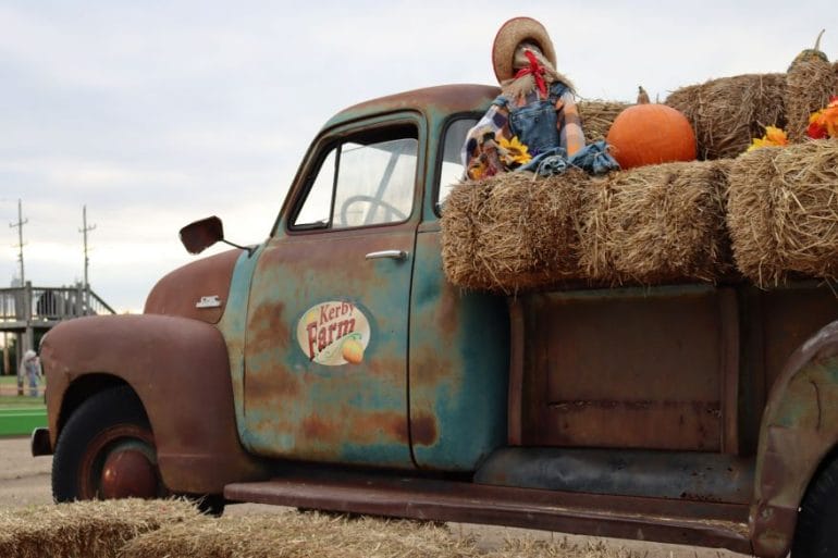 Pumpkin patches offer perfect photo opportunities, like the pumpkin-covered truck at Kerby Farm.