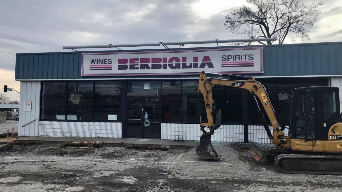 A former Berbiglia Wine & Spirits storefront awaits construction.