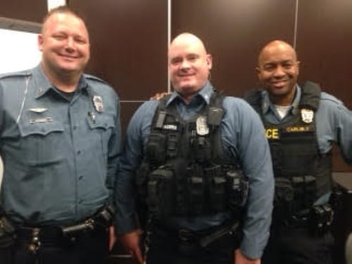Kansas City police officer Douglas Davidson (left), police officer Nathan Magers (center) and Sgt. Corey Carlisle.