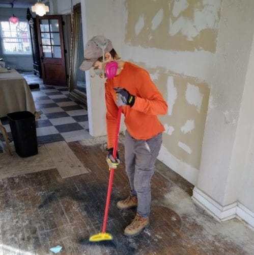 Jerusalem Farm member Teresa Kuppinger working in one of the apartments behind fixed up St. Francis at 300 Gladstone Blvd.