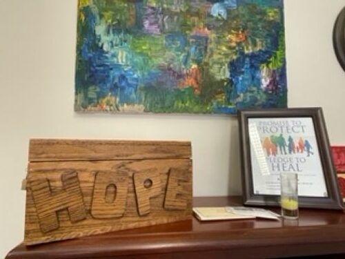 The locked “Hope Box” is kept in the office of Carrie Cooper, director of the Office of Child and Youth Protection for the Diocese of Kansas City-St. Joseph. Since 2016, survivors have been invited to write their personal thoughts, statements of pain and hope to be blessed by the bishop and then placed into the sealed box.