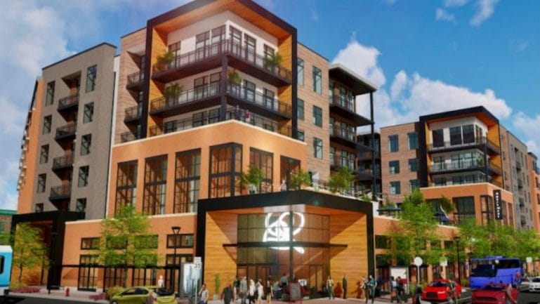 The $60 million Third and Grand apartment development won approval for a 25-year property tax abatement on its second try.
