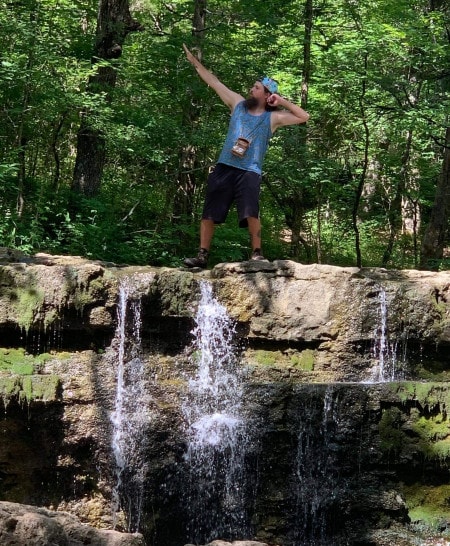 A photo of Darin Good, a 31-year-old adventure enthusiast who calls himself an "Indiana Jones type." He asked what the story was behind Bethany Falls limestone's name.