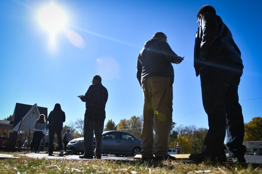 Voters at Heartland Community Church of Christ socially distance while waiting their turn to vote on Nov. 3, 2020, in Platte County, Missouri.