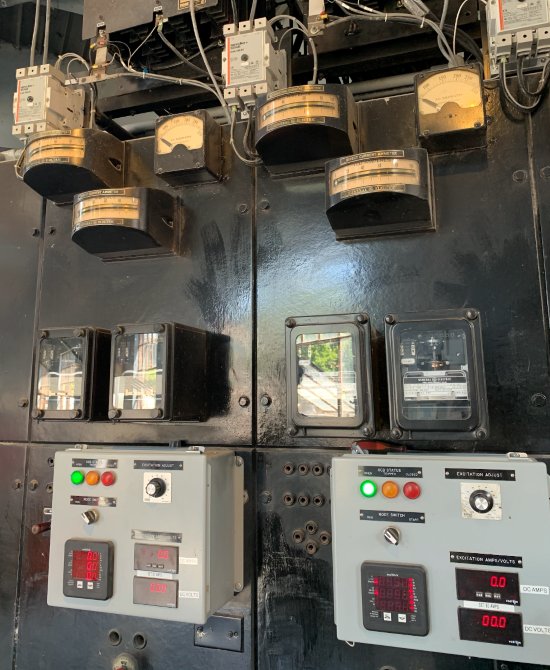 The switch gears that track all the units on how much water is being pumped through the Bowersock hydroelectric plant. The analog gears on the top date back to the 1930s.