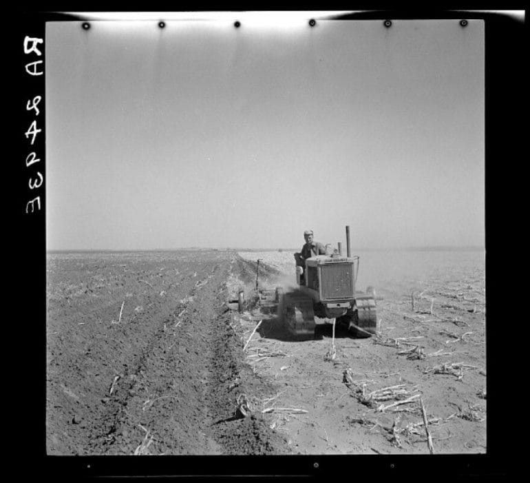 This photo from the Dust Bowl in 1936 shows a farmer working his fields near Liberal, Kansas.