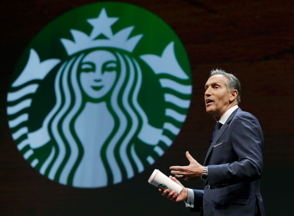 Starbucks CEO Howard Schultz speaks at the coffee company's annual shareholders meeting in Seattle.