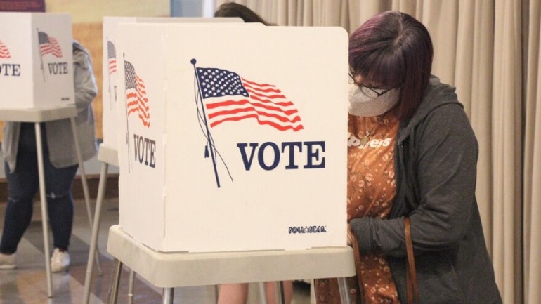 Voters cast their ballots at a polling location in downtown Lawrence.